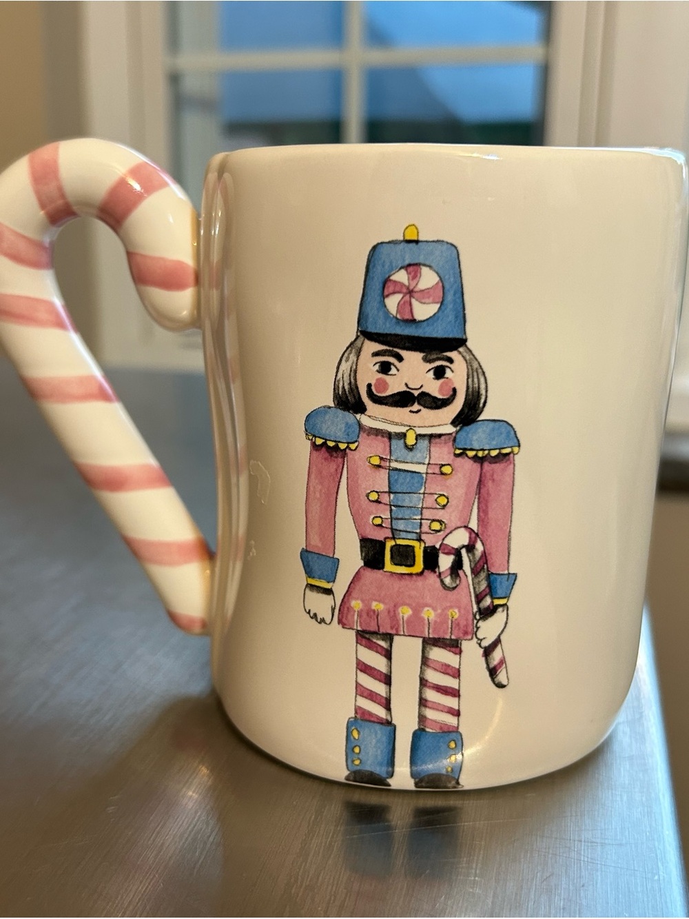 Rae Dunn Sugar n’ Spice Mug with candy cane handle and picture of Nutcracker